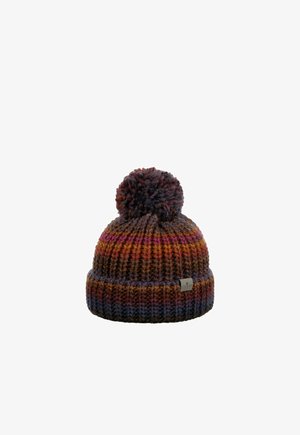 Chunky knit beanie in brown, orange, purple, and red tones with a large pom-pom on top and a small fabric brand tag on the cuff.