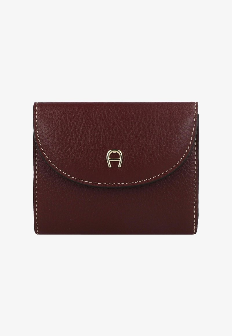 Burgundy leather wallet with a rounded flap, top-stitching, and a gold metallic logo accent at the center front. Compact and textured design.