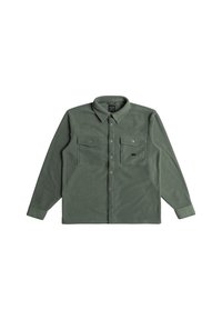 Green flannel shirt with a button-down collar, long sleeves, two chest pockets, and a soft texture. Features a front button closure.