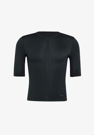 T-shirt de sport noir à manches courtes avec une fermeture éclair frontale, fabriqué en tissu texturé, avec un logo subtil sur le côté de la poitrine.