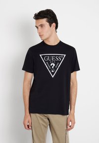 Guess LOGO-DREIECK - T-shirt con stampa - schwarz