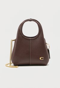 Dark brown textured leather handbag with circular top handle, gold chain strap, and small gold "C" logo on front.