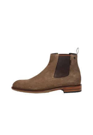 Bottine Chelsea en daim marron avec panneau latéral élastique, languette à l'arrière et semelle en cuir avec talon superposé.