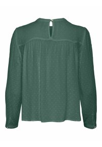 Blouse verte à manches longues en tissu texturé avec une ouverture en forme de clé à l'arrière et une fermeture par bouton. Présente des motifs subtils en relief de petits points.