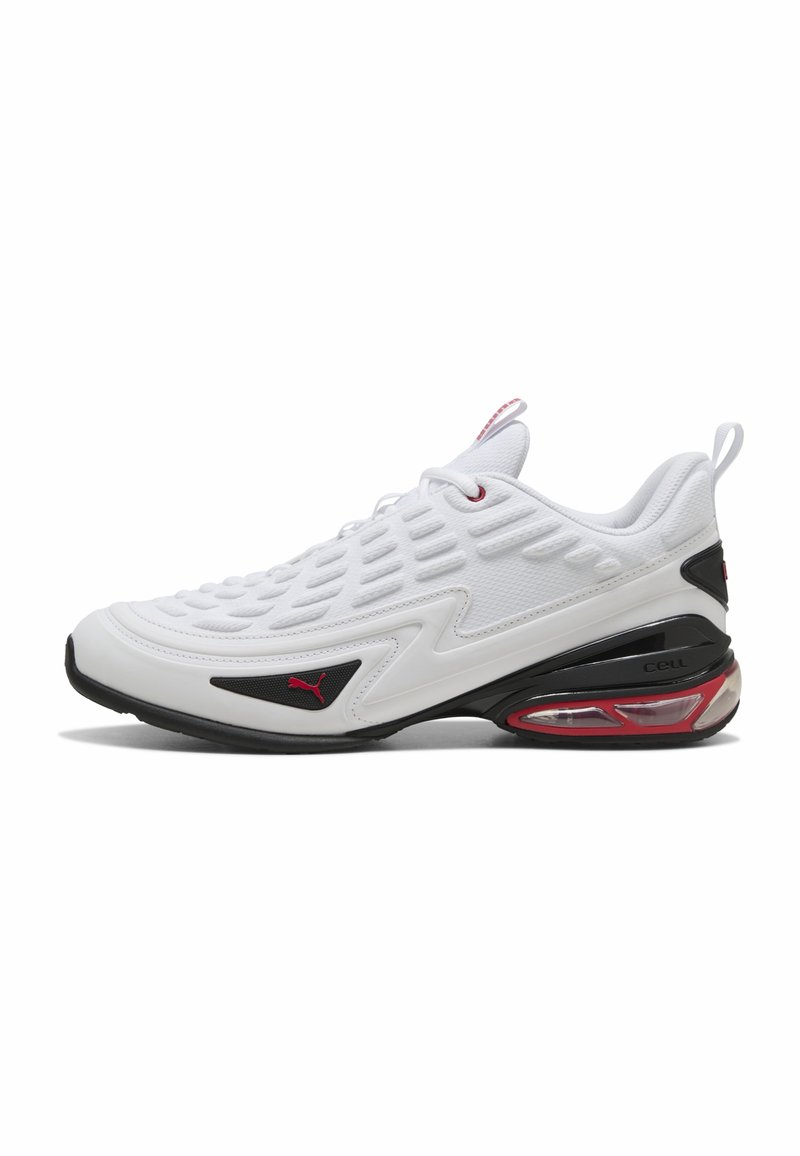 Weiße Sportschuhe mit gemustertem Obermaterial, schwarzen Akzenten, roten Details und sichtbarer Luftpolsterung in der Ferse. Mit Schnürsenkeln und Zuglasche.