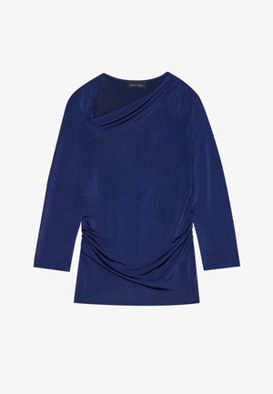 Dunkelblaues Langarmoberteil mit drapiertem Ausschnitt, gerafftem Seitendetail und weichem, dehnbarem Stoff. Das Etikett trägt die Aufschrift "ANNA FIELD".