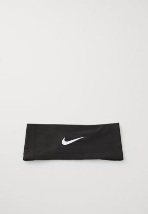 Black fabric headband with a smooth texture featuring a white Nike logo. Designed for athletic use, it is stretchy and shaped to fit securely.