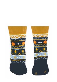 Skarpetki dziane z musztardowym ściągaczem, ciemnoniebieską bazą i wzorami dyni, kwiatów oraz kształtów geometrycznych w kolorze żółtym i jasnoniebieskim.