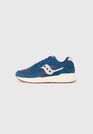 Blue suede and mesh athletic sneaker with a white logo, laces, and a textured rubber sole. Features padded collar and contrasting accents.