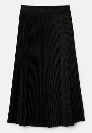 Falda negra plisada con un diseño texturizado, cintura elástica y pliegues en capas que añaden movimiento y profundidad.