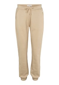 Beige mjukisbyxor av mjukt tyg, med dragsko i midjan, sidofickor och ribbade muddar vid anklarna. Enkel design med minimala detaljer.