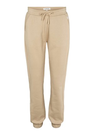 Bézs színű melegítőnadrág puha anyagból, zsínóros derékrésszel, oldalzsebekkel és bordázott szegéllyel a boka körül. Egyszerű dizájn, minimális díszítéssel.