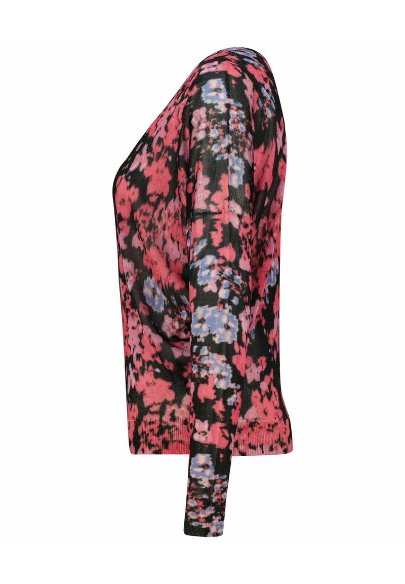 Suéter de manga larga con un patrón floral abstracto en rojo, negro y azul, mostrado de lado sobre un fondo blanco.