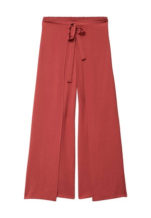 Wide-leg rust-colored pants with elastic waistband and fabric tie belt, made from lightweight textured material.