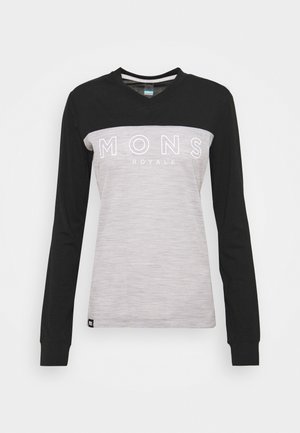 Langärmeliges V-Ausschnitt-Shirt mit schwarzen Ärmeln und oberer Brust, hellgrauem Rumpf und dem Schriftzug „MONS ROYALE“ über der Brust.