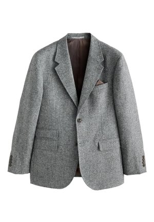 Blazer en laine grise avec une finition texturée, cols crantés, deux poches avant et une poche poitrine avec un accent marron. Fermeture à deux boutons.