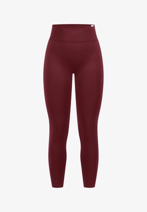 Bordeaux leggings gemaakt van rekbare, gladde stof; hoge tailleband; getailleerd ontwerp; geen zichtbare patronen of hardwareaccenten.