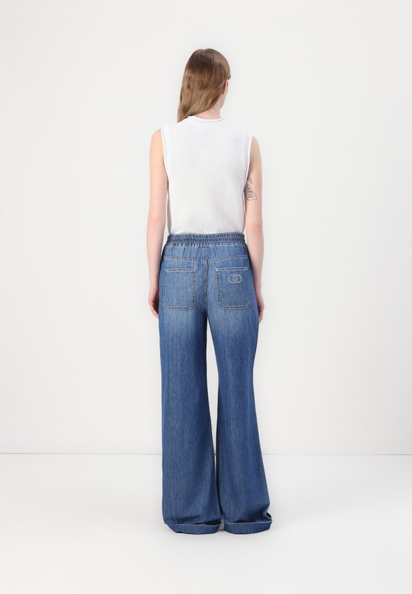 BEAT BRAID - Flared Jeans - work wash3