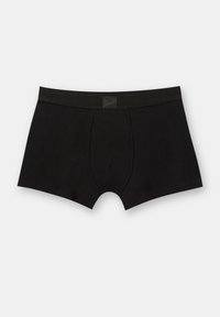 Sorte boxer briefs lavet af bomuld, med en blød talje med et logomærke, korte ben og en pouch-design for støtte.