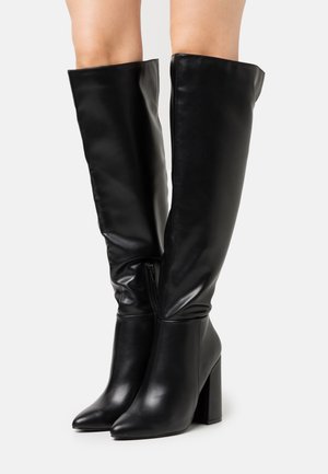 High heeled boots - black