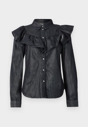 Dunkelblaue Jeanshemd mit Rüschendetail an der Vorderseite, Knopfverschluss und langen Ärmeln mit Manschetten. Der Stoff hat einen dezenten Glanz.