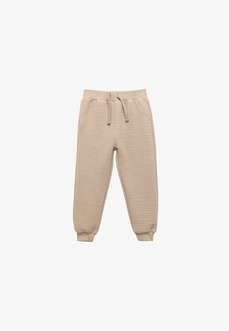 Beige texturierte Sweatpants aus geripptem Stoff, mit elastischem Bund, verstellbarem Kordelzug und schmal zulaufenden Bündchen. Ausgestattet mit zwei seitlichen Taschen.