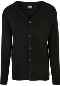 Svart stickad cardigan med långa ärmar, v-ringad hals, knappknäppning fram och ribbad kant. Har fem svarta knappar ner i mitten.