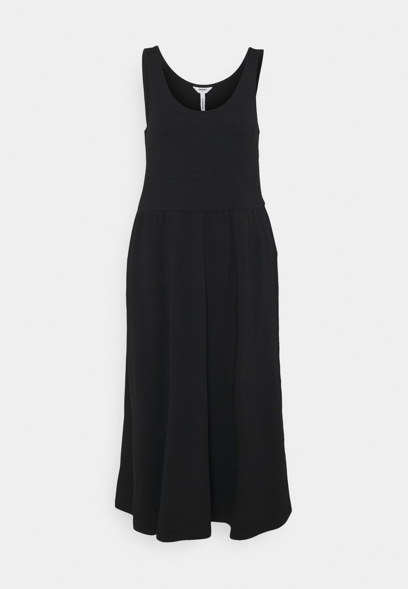 Robe maxi sans manches noire en tissu doux, présentant un décolleté arrondi et une silhouette fluide, avec une taille froncée pour plus de mouvement.