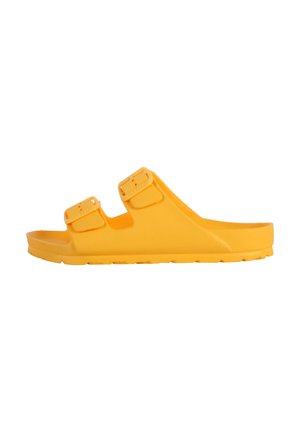 Yellow rubber slide sandal with two adjustable straps, a molded footbed, and a textured outsole for traction.