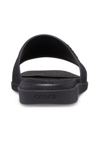 Black rubber slide sandal with a smooth texture, rounded back, and flat sole. Features a slight heel and embossed logo on the side.