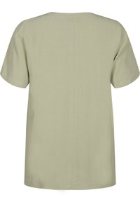 Short-sleeve, light green blouse made of a smooth fabric. Straight cut with subtle seam details and a rounded neckline.