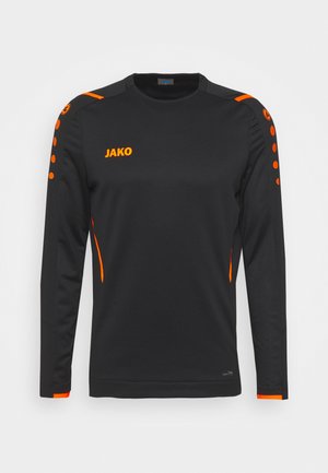 Langsleeve zwarte sportshirt met oranje accenten, voorzien van een ronde halslijn en decoratieve knopen op de schouders. Merklogo weergegeven.