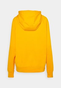 Geel hoodie met een kangoeroezak en ribgebreide manchetten. Zacht, fleece materiaal; lichtjes relaxed fit; gladde textuur.