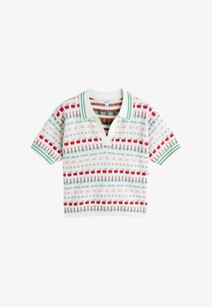 Lühikeste varrukatega valge kootud polo rohelise äärisega, millel on punaste õunte, aiaharkide, lukkude ja väikeste lillede mustrid horisontaalsetes ridades.