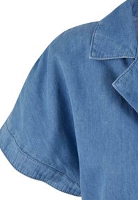 Short-sleeve denim shirt with a classic collar, visible seam stitching on shoulder and sleeve edges, blue fabric texture.