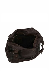 Borsa a spalla in pelle marrone con forma arrotondata, chiusura zip, tasche interne e dettagli di cucitura sottile. Finitura morbida e texturizzata.