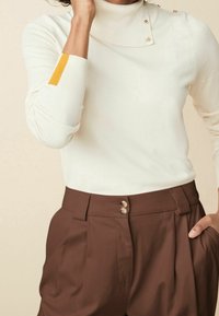 Next Sweter
