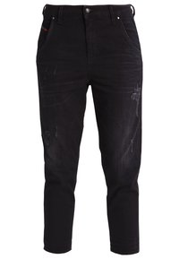 Schwarze Denim-Jeans mit schmalem Schnitt, mit distressed Details, Fünf-Pocket-Design und Knopfverschluss. Glatte Textur und strapazierfähiger Stoff.