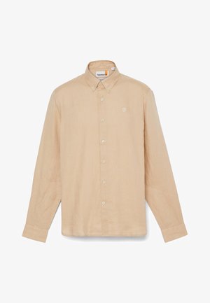 Beżowa, długosleeve koszula zapinana na guziki, wykonana z lekkiego materiału. Posiada klasyczny kołnierzyk, guziki z przodu oraz małe logo na piersi.