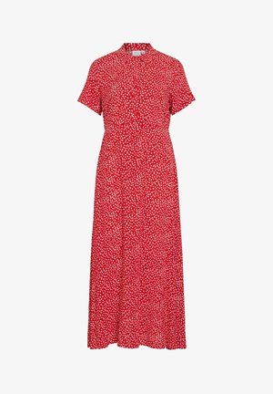 Robe midi rouge à manches courtes avec des pois blancs irréguliers, devant à boutons et petit col.
