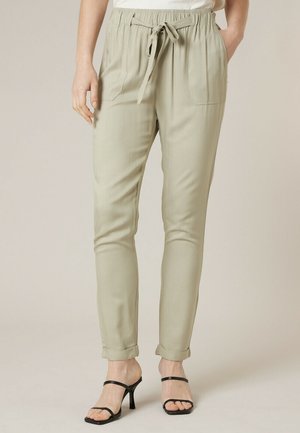 ELIDA - Pantalon classique - tilleul