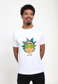 White cotton T-shirt featuring a colorful graphic of a cartoon character with green circular glasses and floral accents.