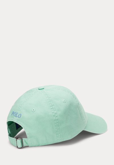 Mintgrønn baseballcaps laget av bomull med justerbar stropp. Har en brodert "POLO"-logo på baksiden og ton-i-ton søm.
