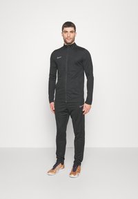 Nike Performance - ACADEMY TRACK BRANDED - Tracksuit - black/white Thumbnail Image 1