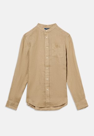 Beige overhemd met lange mouwen, knopen aan de voorkant, mandarin kraag en borstzak, gemaakt van licht linnenstof.