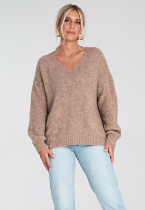 - Sweter