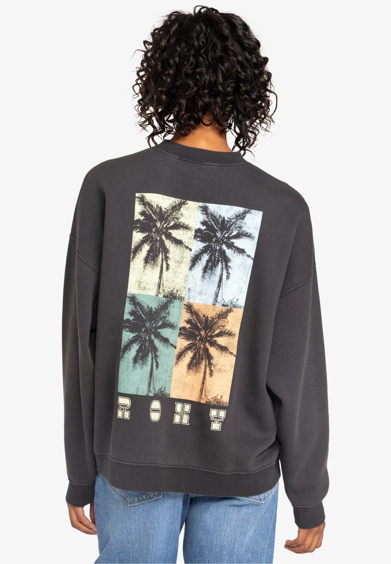 Felpa grigia scura con vestibilità ampia, caratterizzata da una grafica sul retro di palme disposte in quattro quadrati di teal, giallo e arancione con la scritta "ROXY".