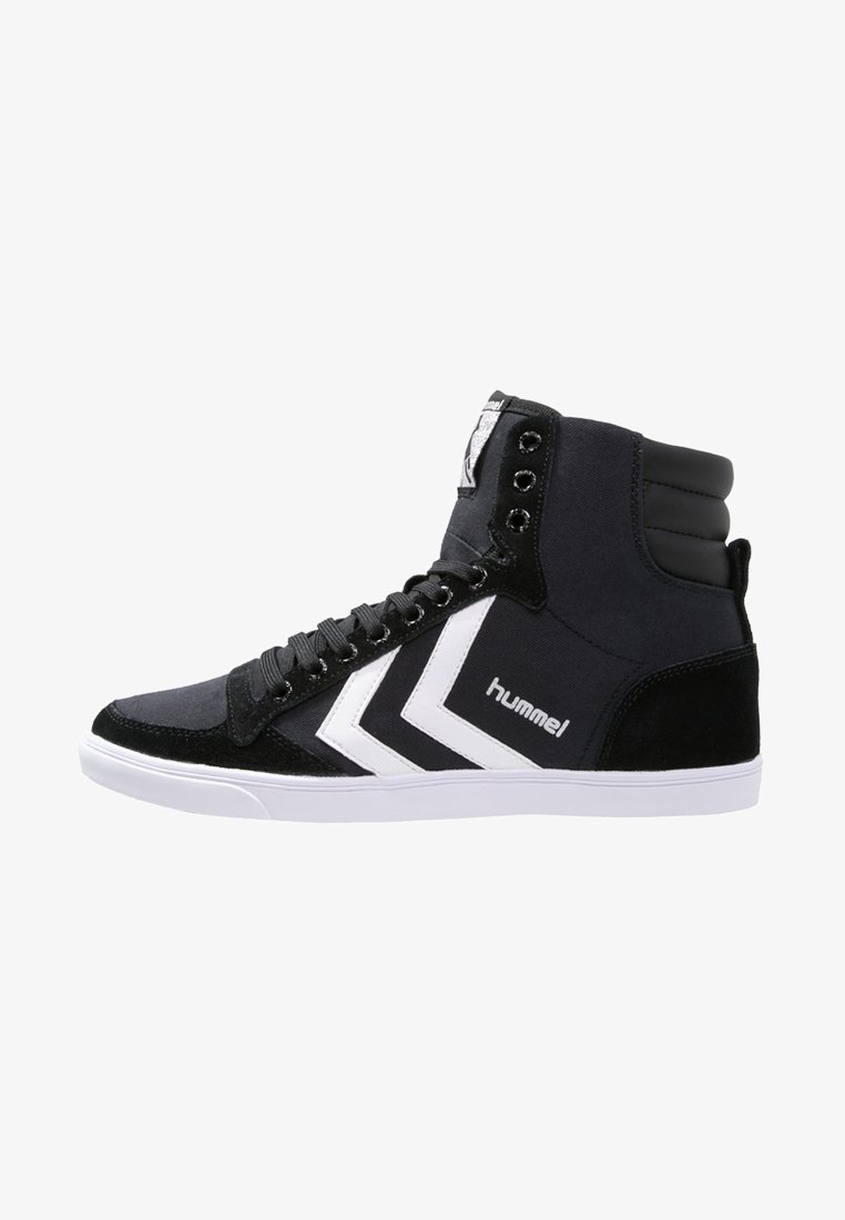 High-top sneakers with a black canvas upper, suede accents, white rubber sole, and bold white chevron logo. Features metal eyelets and padded collar.