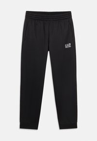 Pantalons de sport noirs avec une taille élastique, poches latérales et logos discrets. Tissu lisse avec une coupe fuselée aux chevilles.