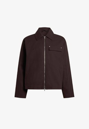 Dark brown jacket with a front zipper, a point collar, side pockets, and a chest pocket; features three stripes on sleeves and silver accents.